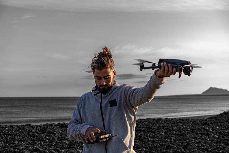 Javier flying a drone